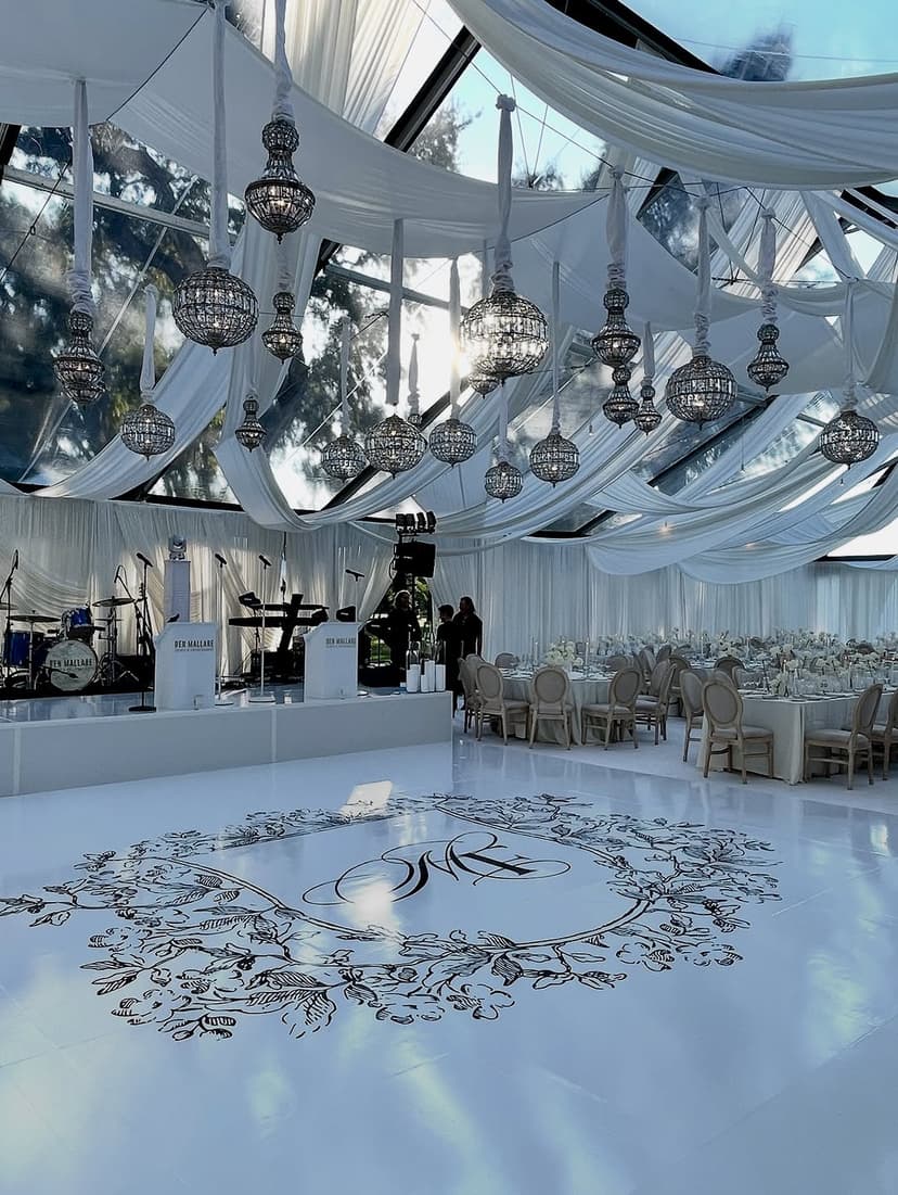 Elegant white monogram dance floor with wreath design