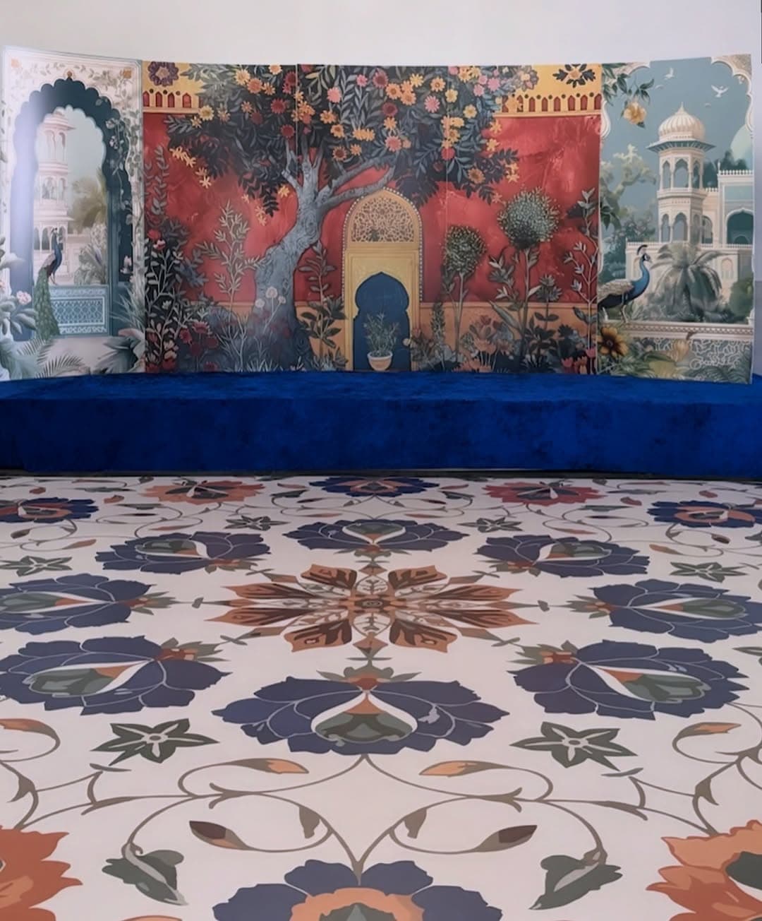 Vibrant dance floor wrap with navy and coral botanical patterns
